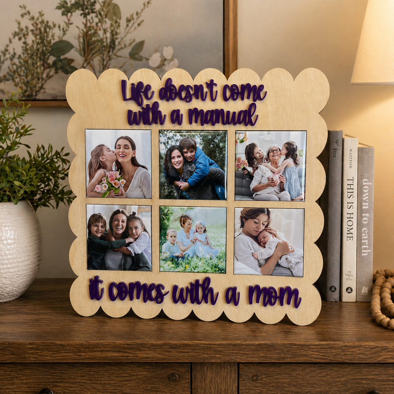 Decorative photo frame with family photos and text on a wooden surface.